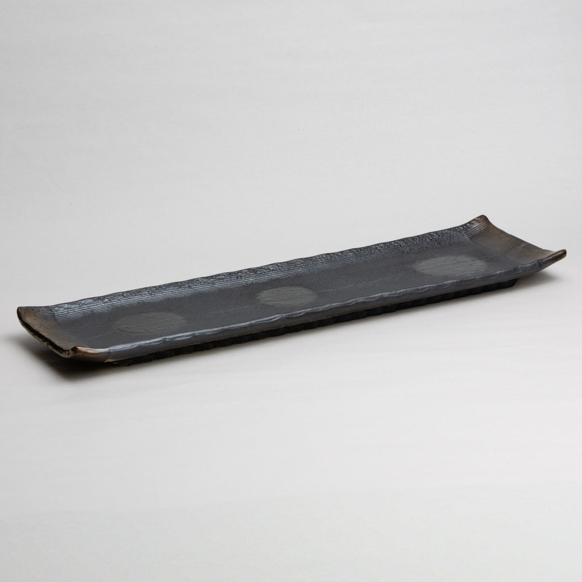 111-1493 Spotts on black rectangular plate (hand made)