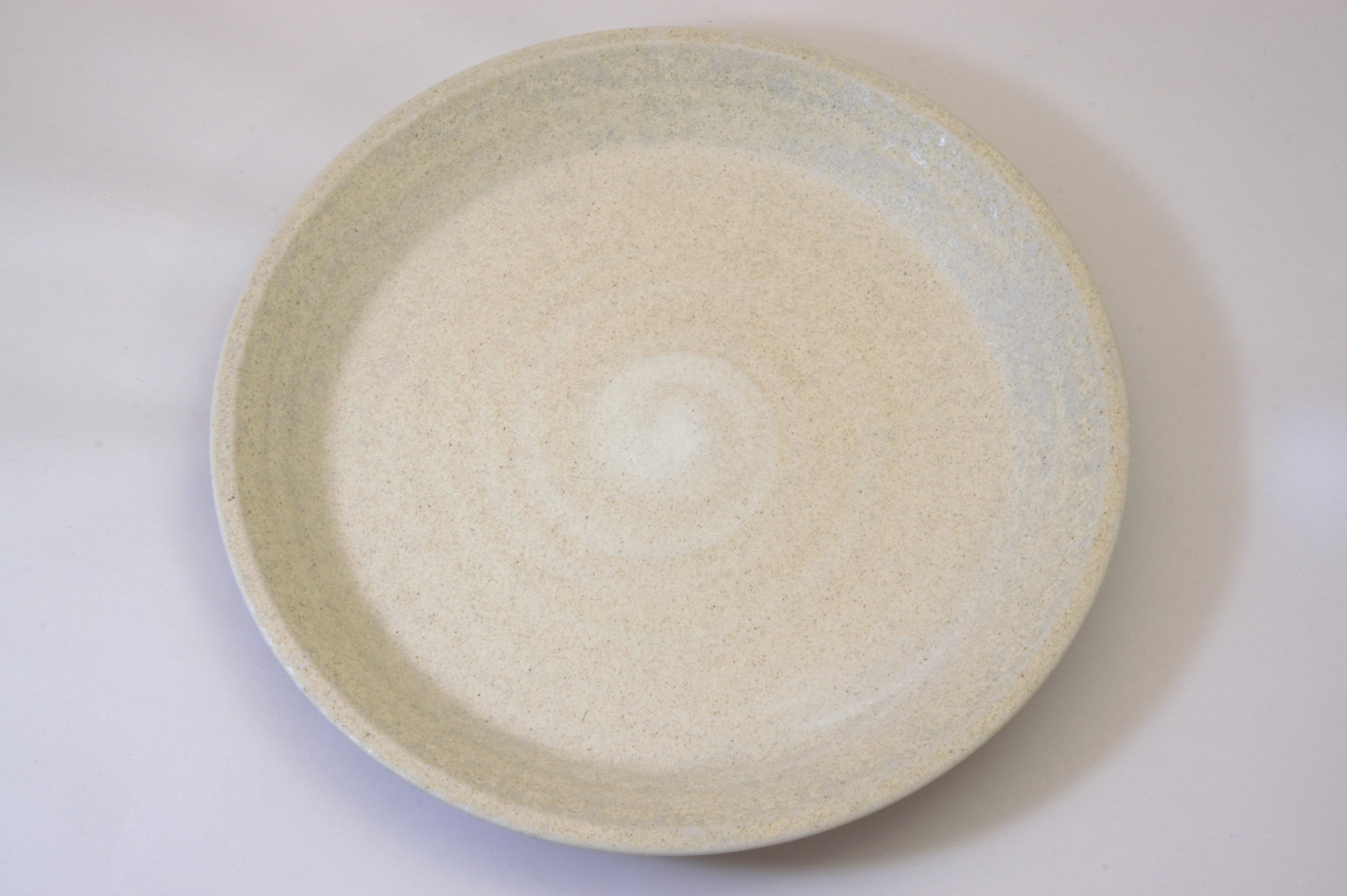 129-6709 Cream sand dinner plate