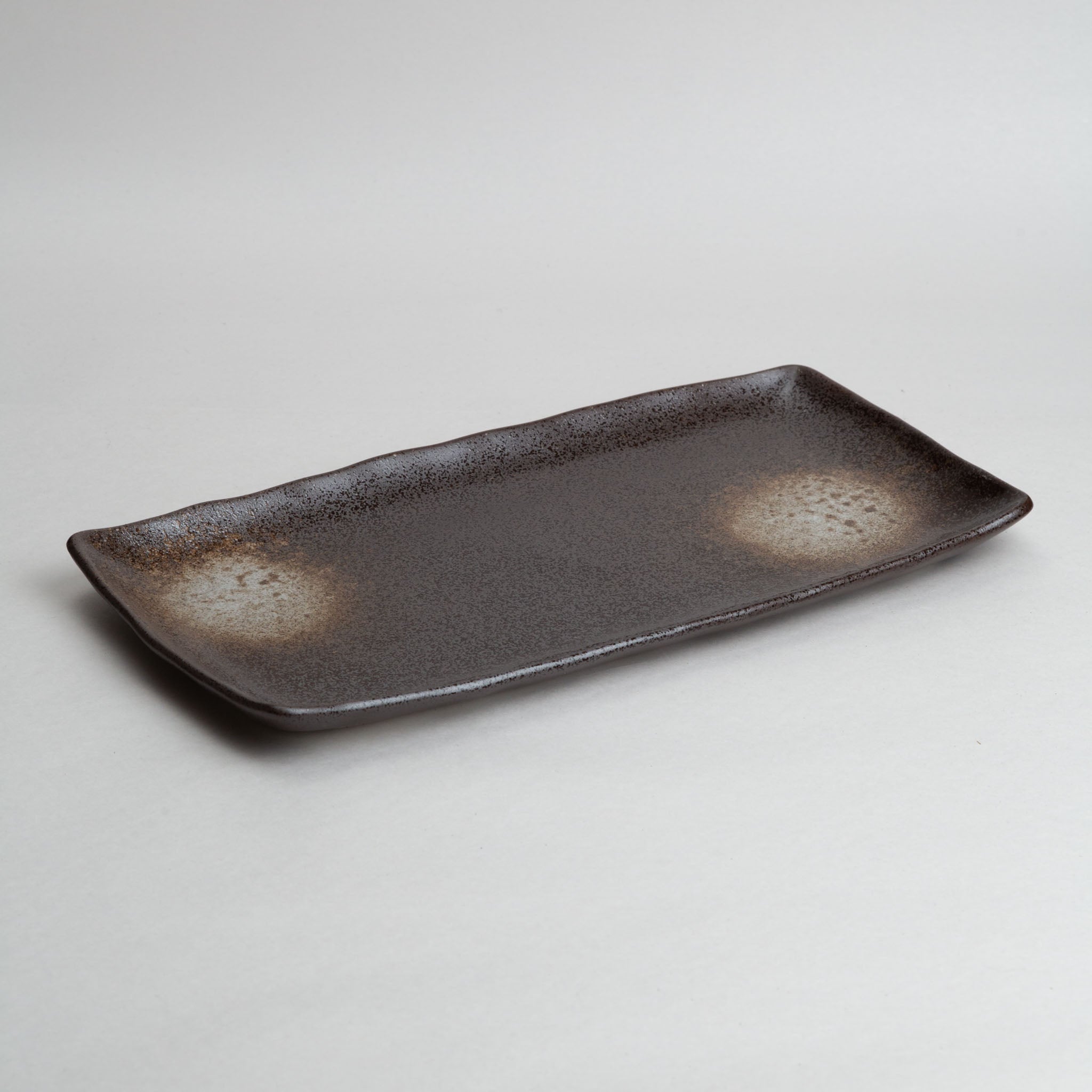 168-6065 Spots on brown Hokke plate