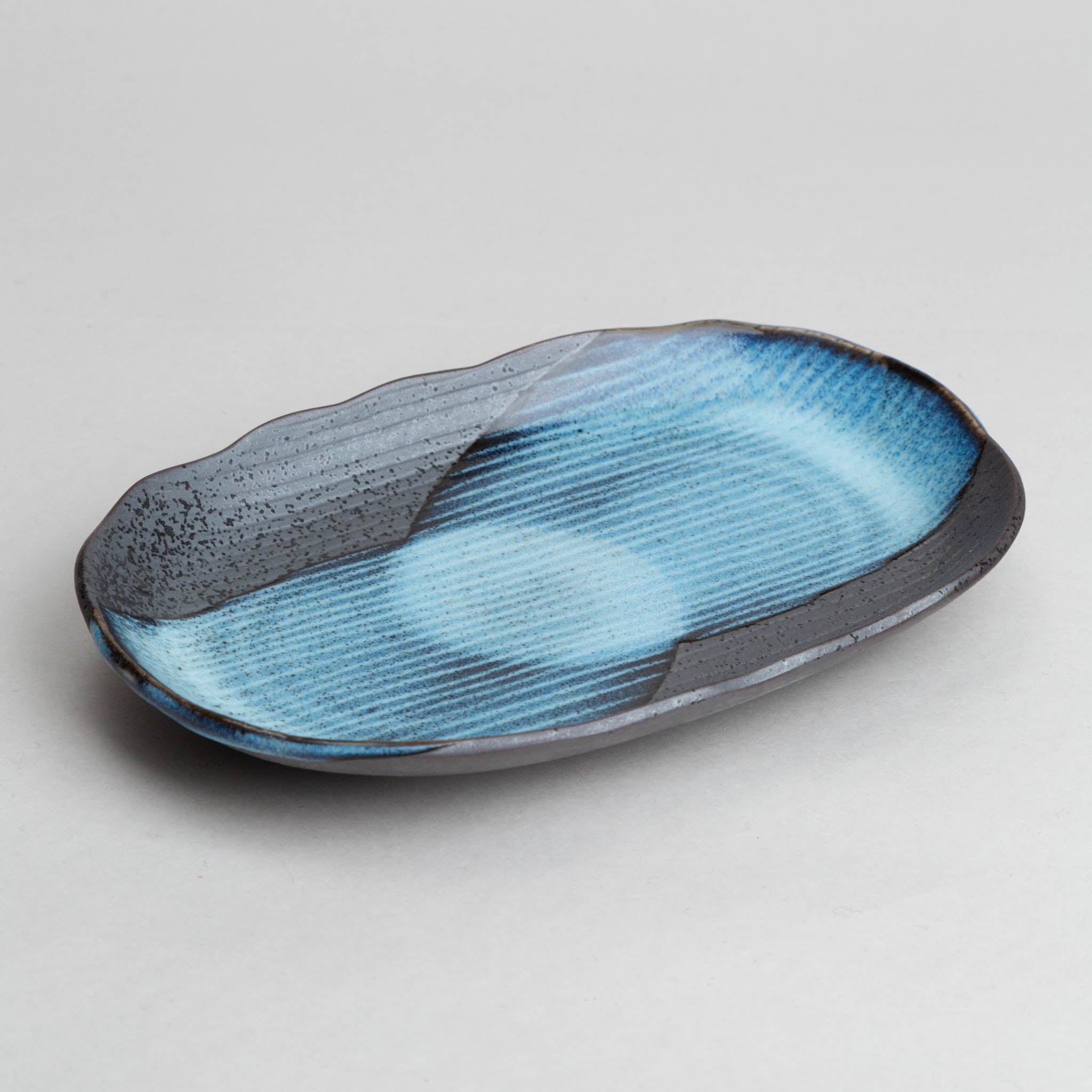 191-6028 Blue on black oval plate