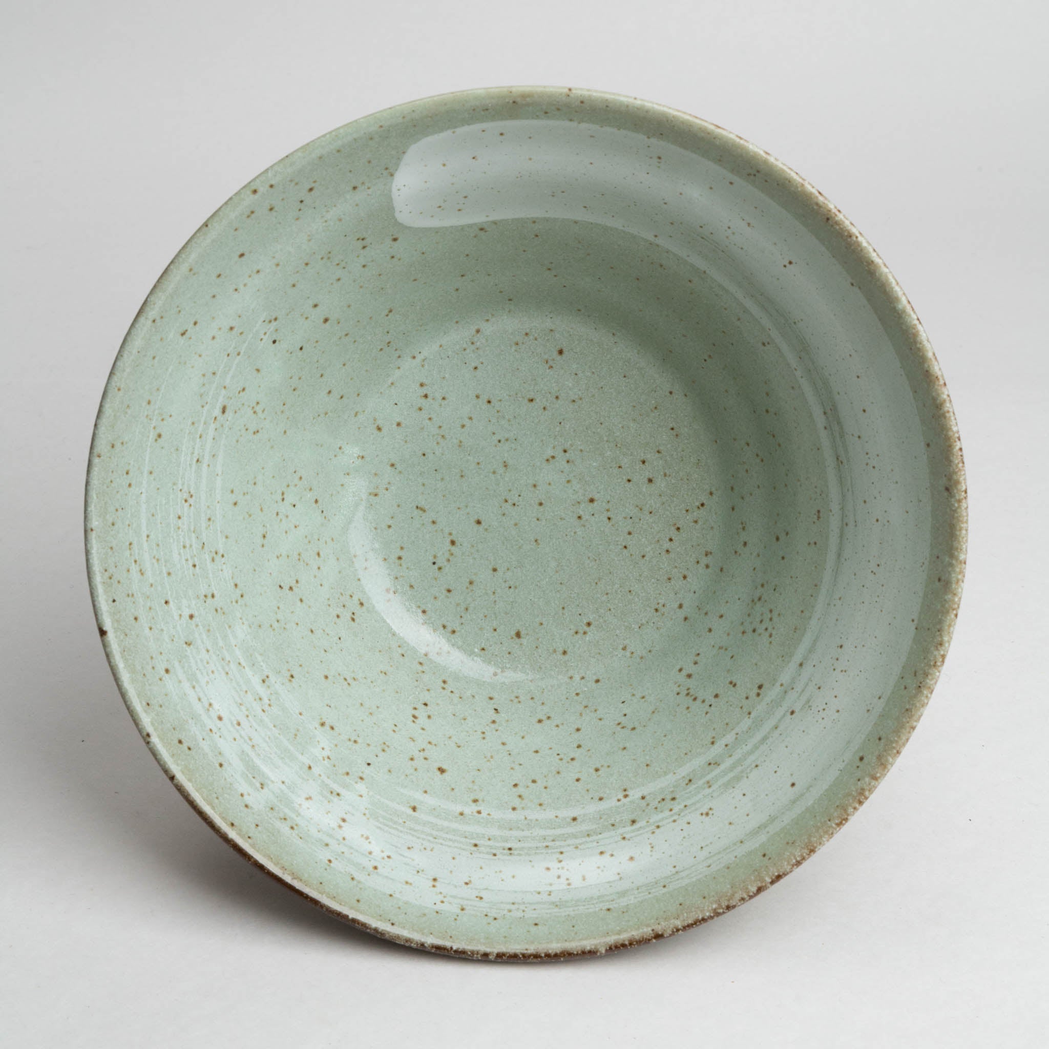 241-1539 White brush on pale green ramen bowl