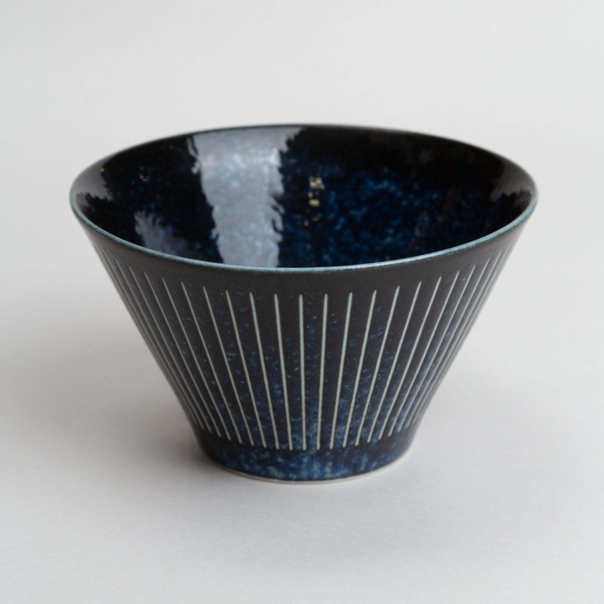 311-0553 Lines on blue bowl