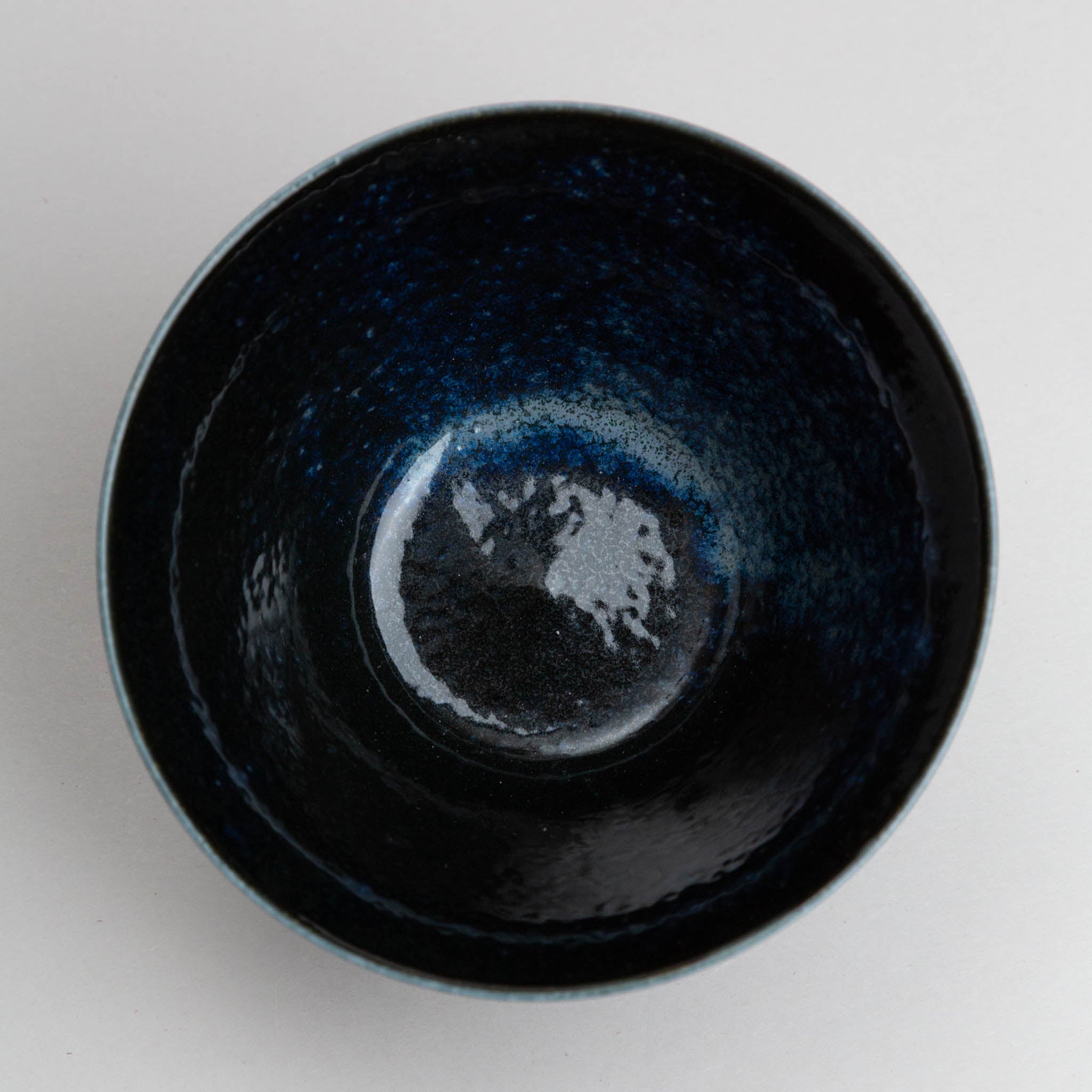 311-0553 Lines on blue bowl