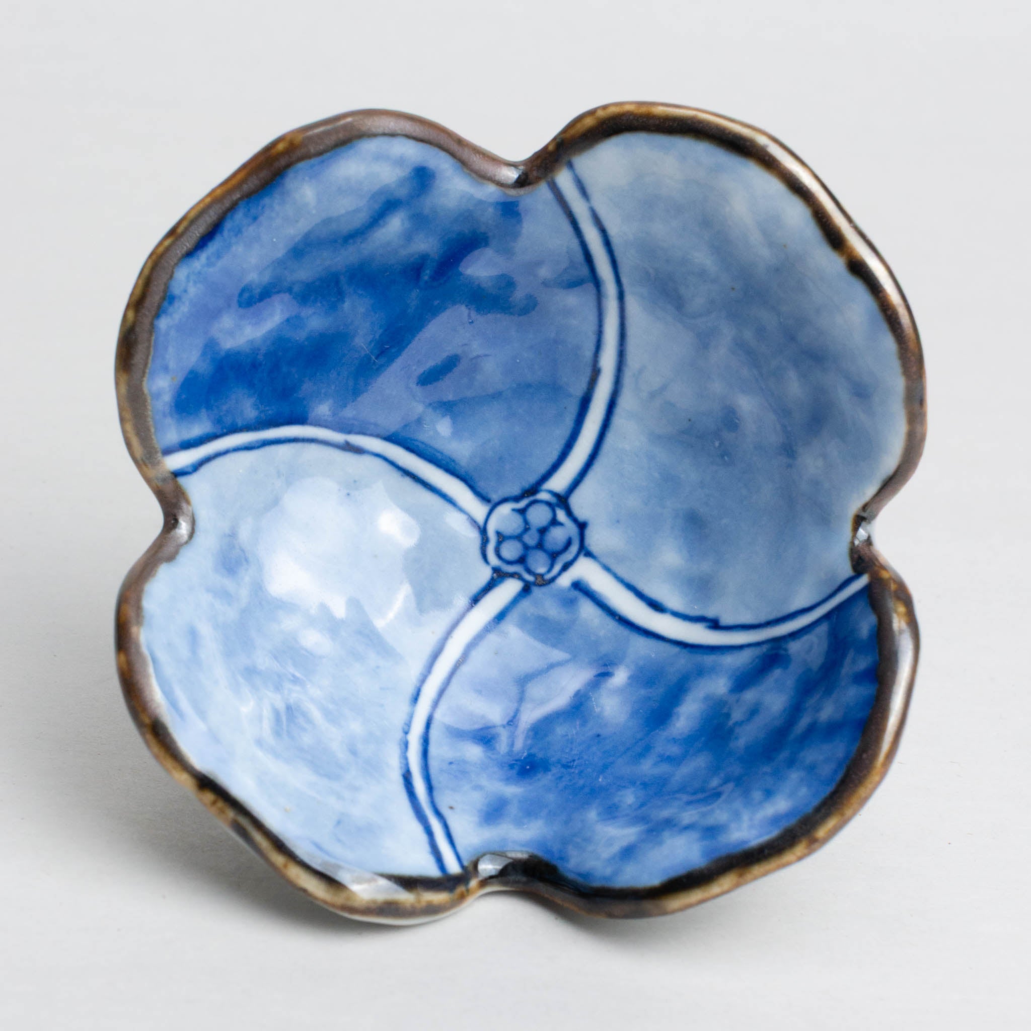 419-7331 Flower shaped blue ramekin