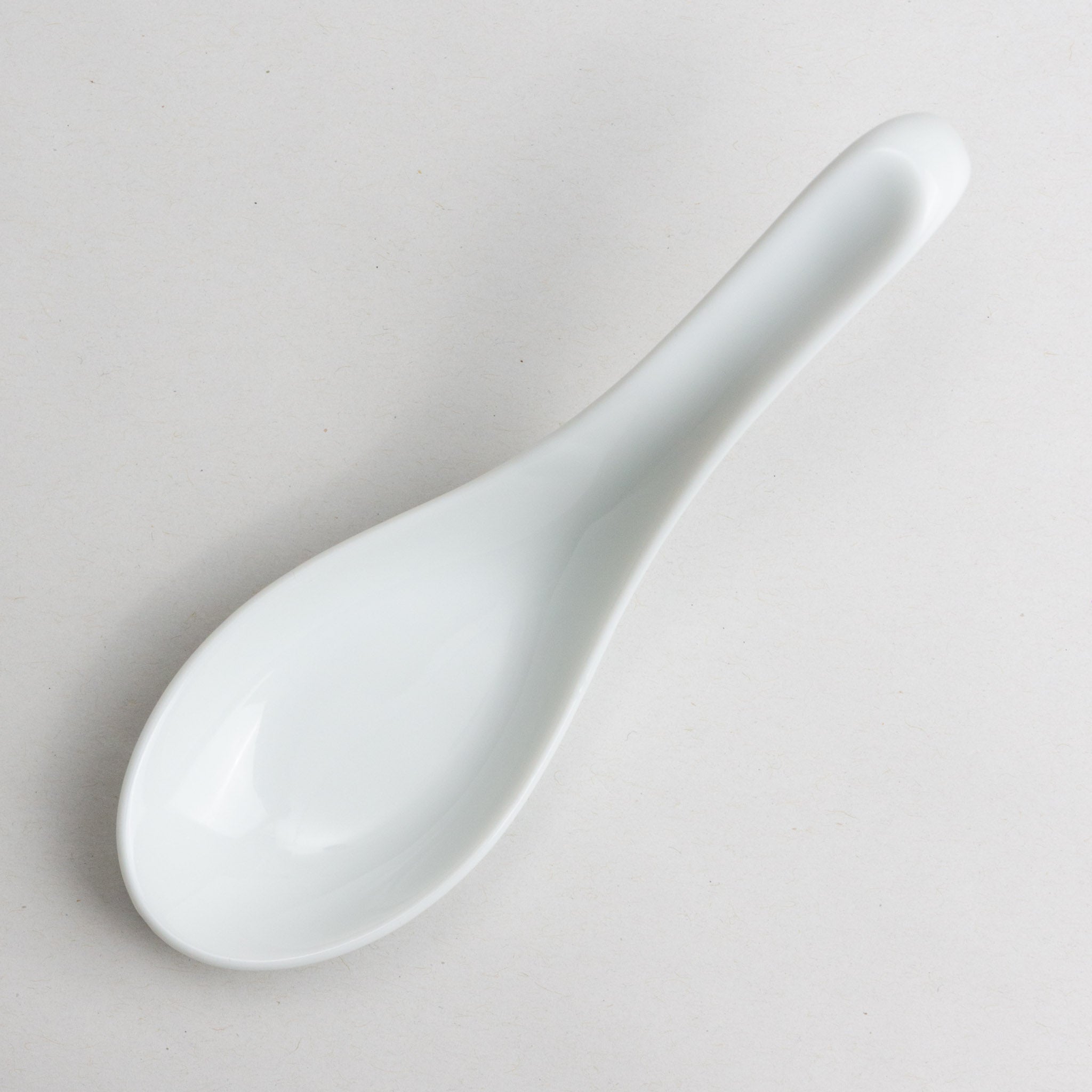 748-0095 White ceramic spoon