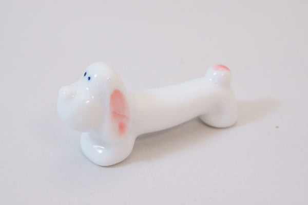 761-1145 Pink sausage dog chopsticks rest